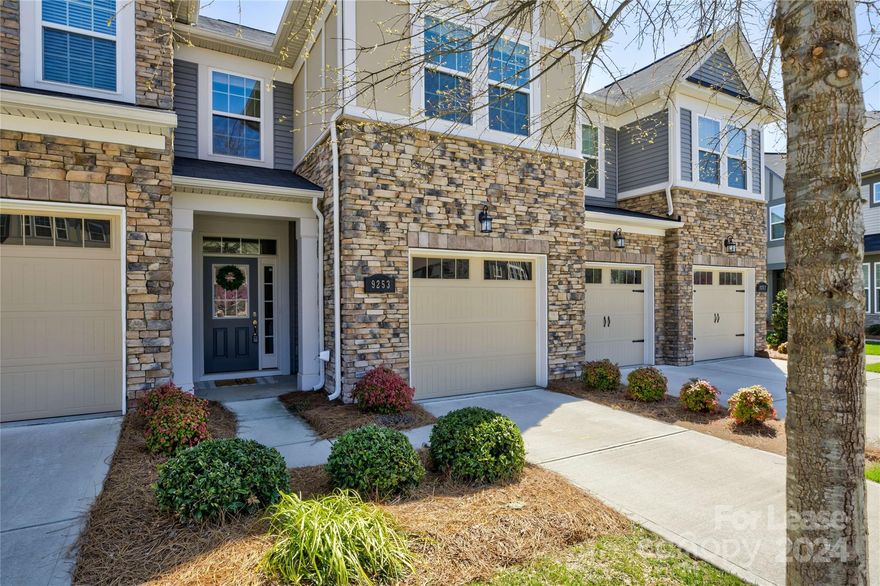 Step into this meticulously maintained and spacious townhome nestled in the sought-after Berewick community with resort-style amenities including a pool, playground, beach volleyball courts, dog park, gym, & clubhouse. Inside discover gleaming hardwood floors throughout the main level, leading seamlessly to the dining and living areas. The kitchen is an inviting space w/pristine finishes, stainless steel appliances and a cozy gas fireplace. The back patio is an idyllic spot for dining and entertaining under the open sky. Upstairs, retreat to the generously sized primary bedroom suite, complete with dual sinks, a luxurious soaking tub, a stand-up shower, and a spacious walk-in closet. Two additional bedrooms and a full hall bath offer ample space for guests or a dedicated home office. Conveniently positioned just minutes from the Charlotte Premium Outlets, Charlotte Douglas International Airport, restaurants, and I-485, this home presents an unparalleled blend of convenience and luxury!