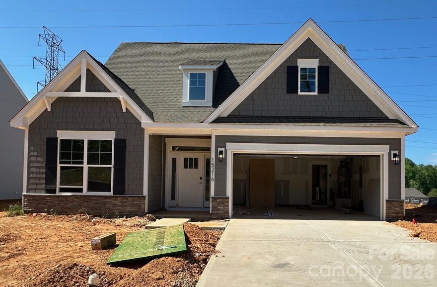 New construction in Huntersville near Birkdale Village and a short drive to Uptown Charlotte! This 1.5-story Amelia plan offers 3 bedrooms, 3 full baths, a screened rear porch, and almost 2,000 square feet of living space. The main, open living area has the family room with Cosmo fireplace & shiplap feature wall, screened porch off the breakfast area, and the kitchen with stainless appliances. The kitchen has white cabinets with a contrasting grey island, quartz counters, and a tile backsplash. The primary suite is also on the main and features a tray ceiling and tiled shower with semi-frameless door. The main floor also includes a foyer with tray ceiling, a mud room with a beadboard drop zone, another bedroom, and a full bath with a tiled, 5-ft shower. The upper level has a spacious loft along with a large bedroom with walk-in closet and a hall bath with a tub/shower combo. Other wonderful decor elements include a tray ceiling in the foyer, white quartz counters in all baths, and stairs with composite treads & metal balusters.
