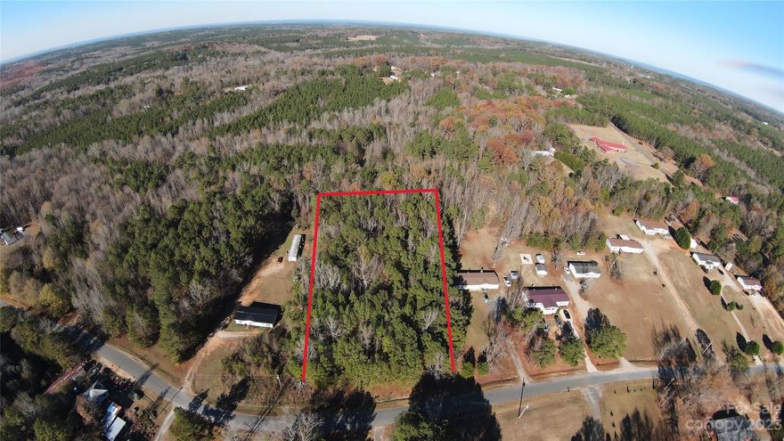 2.38 acre lot on a dead-end street perfect for your dream home! The land has access to county water, and there are no zoning limitations, so a manufactured home is allowed. Schedule a showing today!