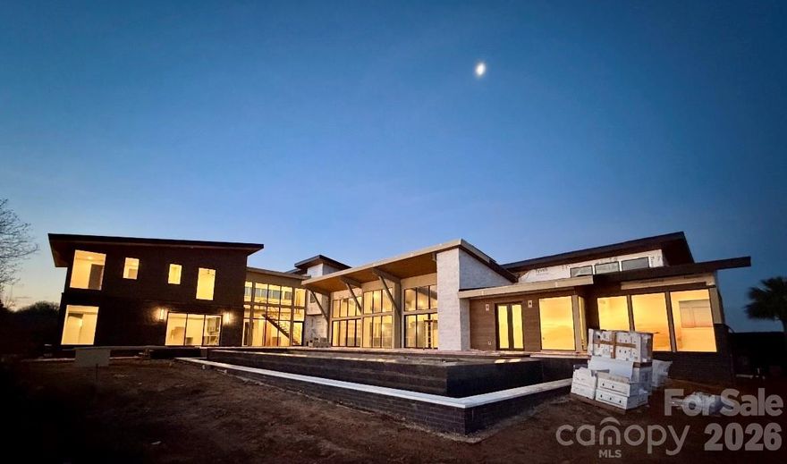 2/15/26 UPDATED PROGRESS PHOTOS! Step into this Ultra-Luxury Build designed by Frazier Home Design & built by Grand Living Homes. Perfectly situated on Lake Norman in Cornelius, this 5 bed, 6 bath home combines refined design, modern comfort, and panoramic waterfront views on the lake. No detail was spared from steel beams, custom cabinetry, waterfall countertops, high-end appliances, sauna, gym, and floor-to-ceiling windows framing water views from nearly every room! A brand-new dock is underway, perfect for sunset cruises, fishing, or launching kayaks. The outdoor living is unmatched, with an infinity-edge pool overlooking the water and space designed for everything from relaxing mornings by the lake to elegant poolside dinners. It’s a true retreat yet just minutes from downtown Cornelius, top-tier restaurants, the Peninsula Club, the marina, and more. This is a rare offering in one of Lake Normans coveted locations! Schedule your private tour today and discover lakefront living at its finest!
