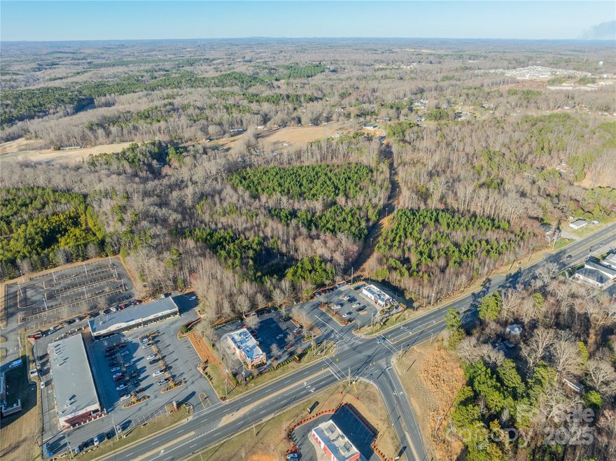 Seize this rare opportunity to own over 25 acres of Highway Business-zoned land in one of Locust’s most rapidly growing commercial corridors. Positioned along a high-traffic thoroughfare, this expansive property offers unmatched visibility and accessibility, making it ideal for a variety of business ventures. With a strategic location surrounded by established businesses and key amenities, this site provides limitless potential for retail, mixed-use, or commercial development. Whether you’re looking to expand an existing enterprise or launch a new project, this high-exposure property is ready to bring your vision to life. Don't miss out on this exceptional investment opportunity!