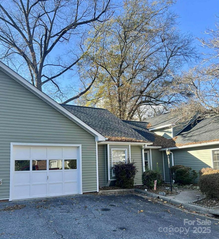 Excellent NE Hickory location! This one-level condominium in Heritage Manor offers convenient access to HWY 127, the Salt Block, shopping, dining, and many of Hickory's well-known amenities. The interior provides a practical layout with a comfortable living area and an attached single car garage. Enjoy morning coffee on the screened-in porch with sliding glass doors surrounding two sides and two skylights. Recent updates include a new roof and siding installed in 2025. A low-maintenance option in a well-managed HOA community with the benefits of in-town living.