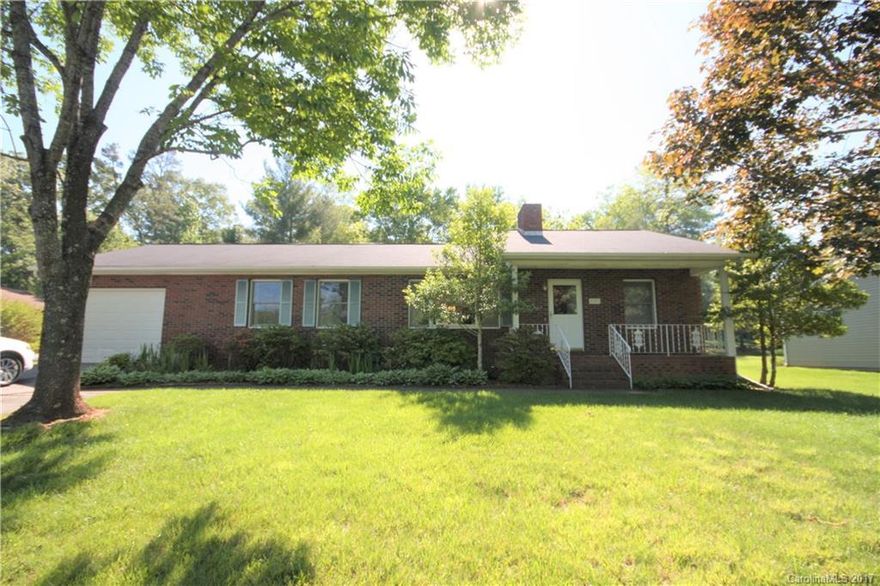 Well maintained home in desirable east Asheville neighborhood on cul-de-sac road. Convenient to Asheville Mall, VA hospital, Blue Ridge Parkway. One level home with large living room, FP with insert, dining room, good size kitchen with plenty of counter space and cabinets, split bedroom plan with roll-in shower in master bath. Large deck in private level back yard. Insulated outbuilding. Great home for young people or retirees. Being offered "as is".