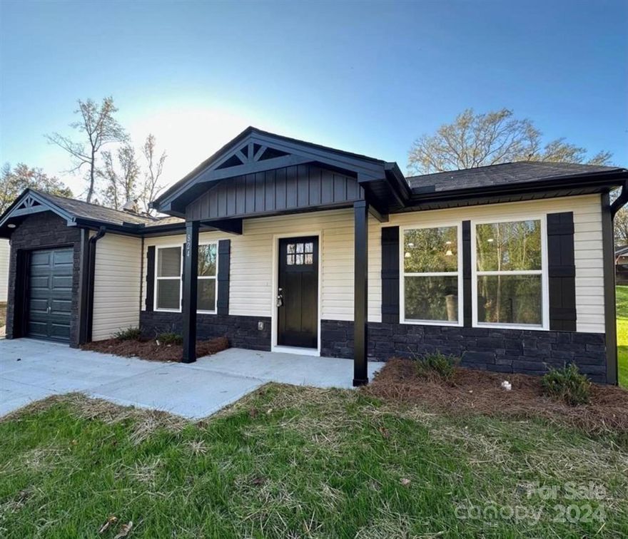 This impressive 3 bedroom, 2 bath, new construction home located in Woodruff is a must-see property, offering a convenient location close to restaurants and shops. Upon entry, you'll notice the open layout of this 1,200 sq ft home, including a large living room, kitchen with dining area, and luxury laminate flooring throughout. The kitchen features stainless steel appliances, a spacious island, and tile backsplash. The hallway leads to two of the bedrooms on the left with a central full bath in between. The laundry room and primary bedroom are on the right side of the hallway. Both bathrooms consists of tile flooring and a shower/tub combo. A door at the end of the hallway provides access to the backyard. This home offers numerous amenities, including an attached one car garage. Schedule a showing today.