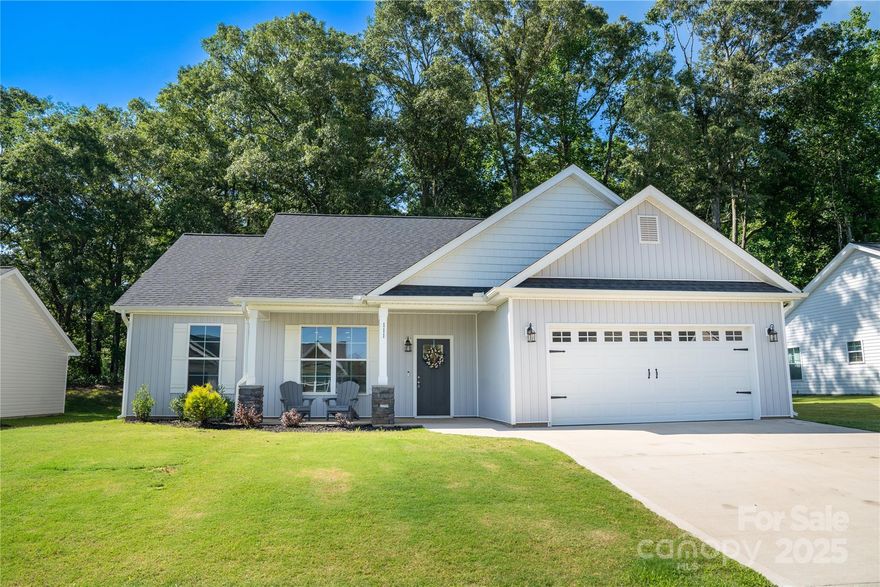 Better than new! This beautifully maintained 3-bedroom, 2-bathroom home is centrally located in the rapidly growing town of Chesnee. Step inside to discover a bright and open floor plan with soaring ceilings in the living room, luxury vinyl flooring throughout, and a stylish kitchen featuring granite countertops—perfect for both everyday living and entertaining. The kitchen comes fully equipped, with all appliances conveying! The spacious primary suite features a HUGE walk-in closet and a spa-like bathroom with dual vanities and a walk-in shower. You'll also enjoy a walk-in laundry room and the washer and dryer convey! Additionally you will have a two-car garage for extra storage and convenience. Built with energy efficiency in mind, the home also includes large covered front and back porches, ideal for relaxing, grilling, or entertaining. The fully sodded, flat backyard backs up to a private treeline, offering peace, privacy, and room to enjoy the outdoors.