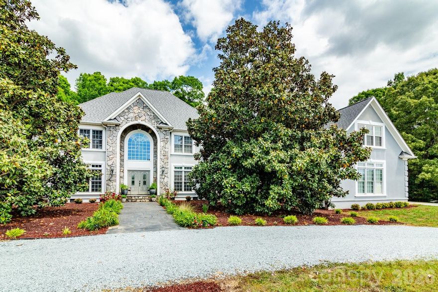 Retreat from the busy city & step into the elegance of this 5,998 sqft Custom Estate featuring a +/- 27.44 acres, a sanctuary of lush forest & farmland—a masterpiece of meticulously designed interiors that exude sophistication w/ high ceilings & natural light throughout. The open floor plan encompasses a Gourmet Kitchen featuring exquisite countertops & solid wood cabinets, a Great Room, Dining Room & an adjoining Sunroom with see-thru fireplace. Down the hall, we find the Primary Suite with an elegant tray ceiling, a refined Bathroom & dual walk-in closets. From the lofty Foyer with inspiring stairs & chandelier, we ascend to the upper level with add'l Bedroom Suites, a stately Office & a walk-in Attic with @800 sqft of storage. The 3-car Garage has extra-tall doors for an RV or other high vehicles. The private Deck is perfect for entertaining or peacefully enjoying the outdoor beauty of this magnificent property. Schedule a personal tour to experience the grandeur of this Estate firsthand.