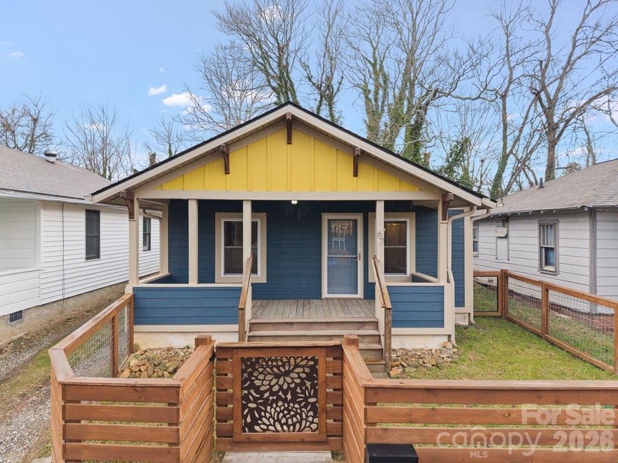 Come be a part of the old AND new West Asheville! In an area that has seen immense growth and transition, this home is one of the few still standing that shares in the history of Asheville's historical industrial and transit hub known as Beacham's Curve. It's PRIMETIME West Asheville! Haywood Road is your backyard. River Arts District, your playground. Oh, and your neighbors, the likes of Archetype Brewing, Pizza Mind, Taco Billy, Hole Donuts and much, much more. While this home serves up a lifestyle of convenience, let's talk about how it feels to come home. An expansive front porch with a fenced in yard welcomes you. Looking for a bit more privacy outside? Look no further than the newly added rooftop deck to enjoy your morning coffee and sunset drinks! Fully renovated in 2020 this cozy bungalow offers an open floorplan with gorgeous Acacia floors throughout. A thoughtfully updated kitchen with a large eat-at island, top notch appliances and plenty of cabinet space. Finishing off with two spacious bedrooms and two (yes TWO) bathrooms. If you are an avid outdoor adventurer, we have just the thing for you! An outdoor shower so you don't track the outdoors...in! There will be plenty of extra storage with the use of the storage trailer that conveys. Let's not forget the most coveted West Asheville amenity...off street parking. Enough parking for two (yes TWO) cars in the back of the house! What more can you ask for?