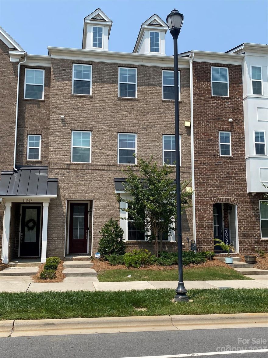 EXECUTIVE TOWNHOME IN REA FARMS!! This 3 story townhome with 2 car Garage is all brick.  Main Level: Private guest suite with full bath can also be a home office or flex room.  The Upper Level: features a stunning kitchen with extra large island, Dining area and Living room. Patio door leads to a balcony off of living area with exterior storage on both sides. Wood floors on this level. The Third Level: The Primary Bedroom is very large with en suite & walk in closet.  Two spacious secondary bedrooms , full hall bath and laundry room are all located on the third level.  Rea Farms Village features so many  amenities at your fingertips: grocery store, post office, gym, school, green space, restaurants,etc. Waverly Shopping Plaza across the street. Conveniently located close to 485 and Providence Rd.