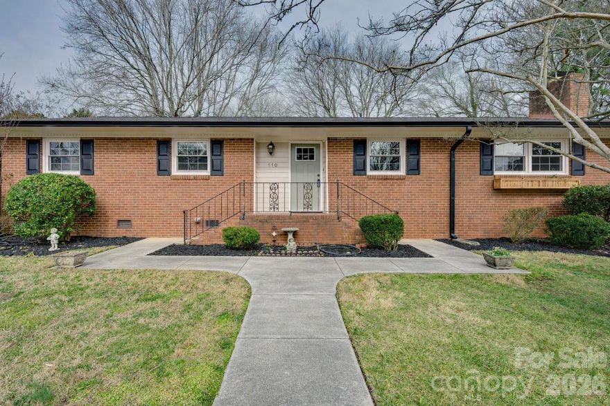 Beautifully fully remodeled 1-story brick ranch ideally located just minutes from Uptown Charlotte in the ever popular Coulwood neighborhood with NO HOA. This move-in-ready home blends classic charm with modern updates throughout. Step inside to an open, light-filled floor plan featuring New flooring, fresh paint throughout, New Windows and stylish fixtures. Roof/Gutters & HVAC both New in 2024. The completely updated kitchen boasts contemporary cabinetry, sleek countertops, and stainless steel appliances—perfect for everyday living and entertaining, while renovated bathrooms showcase modern finishes and thoughtful details. Enjoy the durability and timeless appeal of all-brick construction, complemented by a level yard ideal for relaxing or hosting gatherings. Conveniently located near dining, shopping, parks, and major highways, this home offers easy access to everything Charlotte has to offer. A rare opportunity to own a turnkey ranch-style home in a prime, close-to-downtown location—don’t miss it!  Pool Membership is Optional (Please visit coulwood.org).  Please ask to receive the Features List for more information.