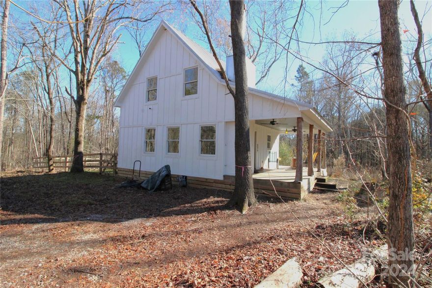 Beautiful private cabin on 13+/- acres. Charming one-bedroom, one-bathroom cabin offers a nice blend of rustic charm and modern amenities. Enjoy the warmth of the heated bathroom floors and Riannai tankless hot water heater. Relax by the wood-burning stove in the main floor living area. The kitchen features a double oven, gas cooktop, exhaust hood, and dishwasher. Outside offers a nice, fenced backyard, outdoor shower and covered front porch. The property touches Chester State Park, providing easy access to other outdoor activities.  The property has a level terrain with gentle rolling topography. Recent timber cutting offers the opportunity to make this land your own. This private cabin is a rare find, perfect for a second home or permanent residence. Property is being sold AS IS.