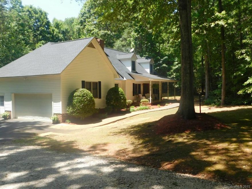 Complete Privacy in this Cape Cod Home on 5 Wooded Acres. Beautiful Hardwood Floors on Majority of 1st Floor. Open Great Rm w/Gas Logs Over looking Screen Porch. Updated Eat In Kitchen w/Granite Counters & Ceramic Tile Backsplash. Spacious Master on Main w/Luxurious Master Bath. Additional Rm off of Kitchen perfect for an Office. Great Size Bedrms 2 & 3 up - both w/Walk In Closets. Bonus Rm up Perfect for Play Room or Extra Storage. In Ground Pool, Rocking Chair Porch & Wired Workshop/Man Cave.