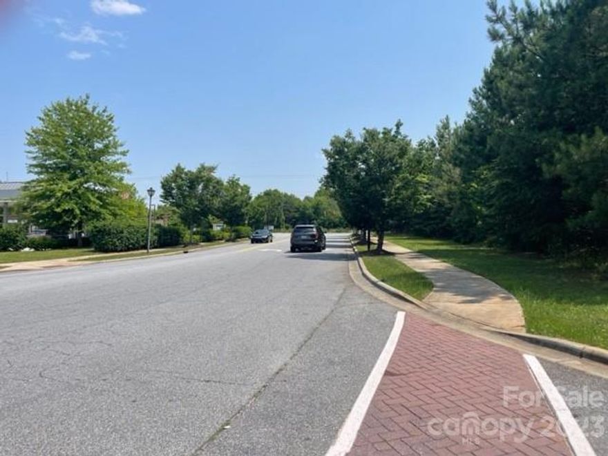 Three acre tract of commercial land located in Conover zoned Corridor Commercial (CC)! The 450' of road frontage provides maximum visibility for your business. The strategic location is directly across from Walmart thereby enhancing your exposure. Close proximity to I40 and Hwy. 16 create easy access to major routes for convenience and growth. CC uses include, but are not limited to:  multi-family housing, child care center, family child care home, hospital/urgent care/clinic, motel/hotel, indoor entertainment, or general retail and service. Build your business in a bustling commercial hub with a strong local economy.