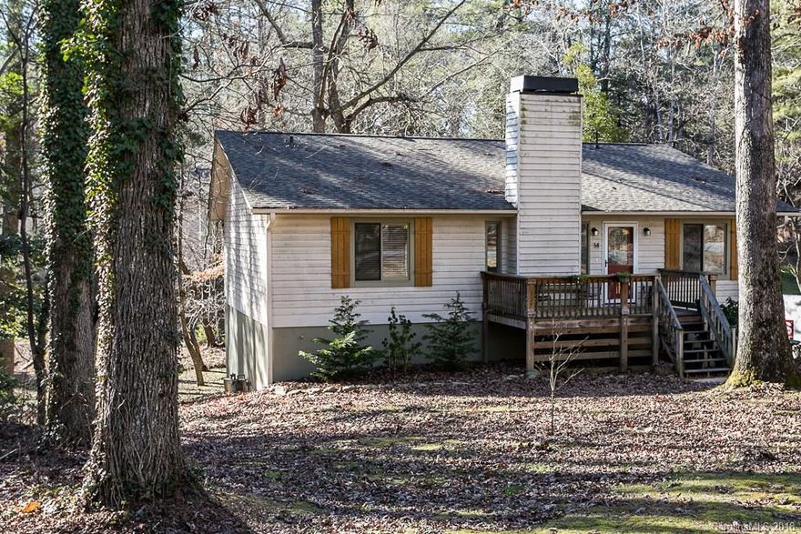 Multiple Offers on this home. Seller is calling for highest and best Offers by Monday Jan 8th at 1pm. Nicely Updated home with newer roof and HVAC system. Natural Gas Stove and Fireplace.  Nestled in a parklike setting with mature trees on a quiet cul-de-sac. 2 car garage in basement with an additional room approximately 200 sq ft not included in the total square footage.  Hot tub is negotiable and does not convey.
