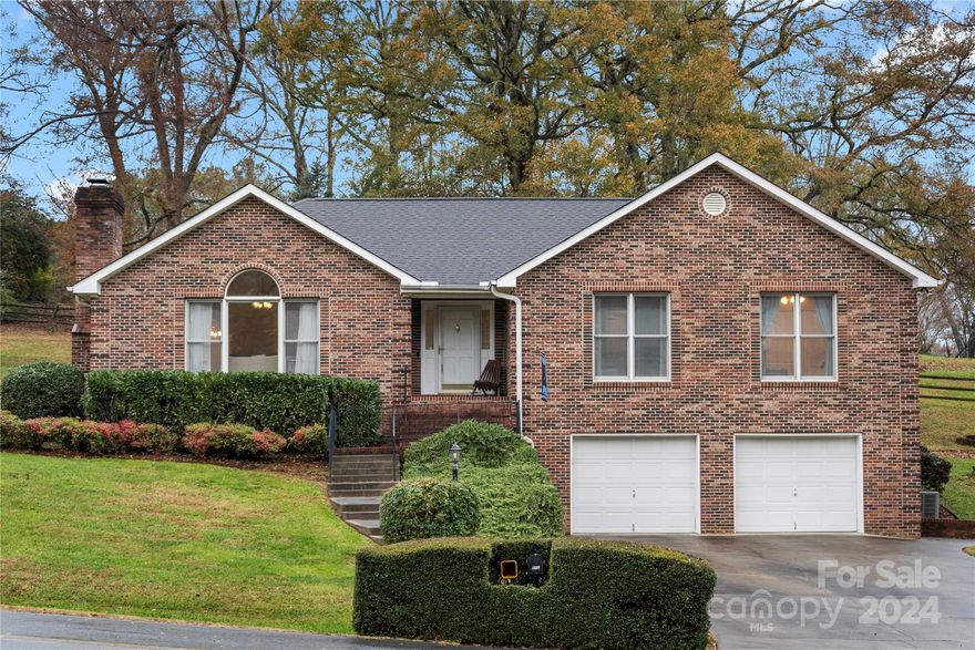 Experience a cozy and inviting atmosphere in this all-brick ranch home. This spacious 3-bedroom, 2-bathroom residence sits on approximately 0.8 acres of land. Inside, you'll discover beautiful matching granite countertops in the kitchen and both bathrooms. The primary bedroom offers ample space, accommodating a Texas-sized king bed comfortably. Entertain guests year-round in the heated sunroom, and enjoy the convenience of two driveways providing plenty of parking for visitors. There is ample storage space with a shed in the backyard and a workshop/gym area in the basement.  This home offers easy access to various grocery stores and Highway 321.  Showings begin on 12/11