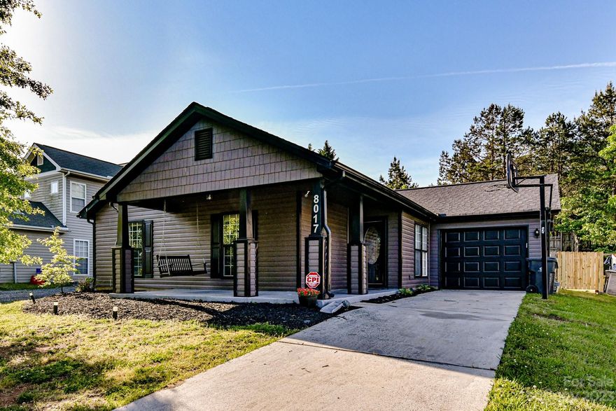 Welcome to this 3 bedroom, 2 bathroom home on a private, cul-de-sac lot! Charming rocking chair front porch greets you to the front door. Fresh paint, LVP flooring & updated light fixtures throughout. Open living room, dining area & kitchen is perfect for entertaining! Kitchen features granite countertops, tile backsplash & stainless steel appliances. Living room adorned with vaulted ceiling, fan & gas fireplace. Primary bedroom with tray ceiling, fan & dual closets. Secondary bedroom boasts large walk-in closet. Sizeable laundry room. Sliding door from dining area leads to spacious deck with seating & backyard with privacy fence. Such a great spot to relax! Roof 2022. Attached 1 car garage. Close to shops and restaurants in Riverbend Village & easy access to Brookshire Blvd & I-485.