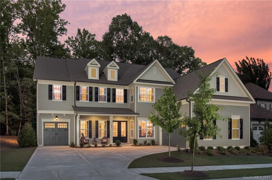 $40K PRICE REDUCTION and sellers offering $3500 in closing cost if under-contract by 10/31. BRING ALL OFFERS SELLERS MOTIVATED! FULLY UPGRADED HOME! Priced under tax value. Seller put in $50k in upgrades after closing.Ft. Mill schools. Features rustic European Oak 8 in. flooring throughout,designer lighting,cast stone fireplace,elegant heavy 3 piece crown molding and trim,California closets,8 ft. solid doors,granite and decorative tile work throughout. 3-car garage, in cul-de-sac!