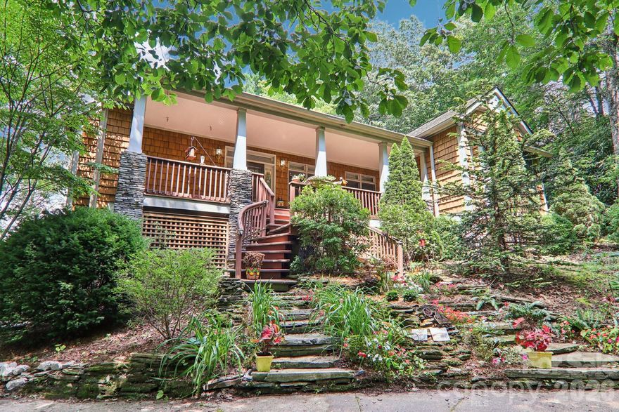 Escape to your charming Craftsman Style home located in the desirable Swiss Pine Lake Community located just five minutes from the Blue Ridge Medical Center, the Grassy Creek Golf Course, and the Blue Ridge Parkway, with convenient access to interstates 26 and 40 and Asheville. 

Set on nearly an acre, this one level two bedroom, two bath home  boasts many special features  throughout. Custom-designed glass windows and an artisan tiled foyer greet you as you walk into the spacious living room with cathedral  ceilings and a stunning stone fireplace. 

The kitchen is a true centerpiece, featuring bespoke rosewood cabinetry, a walk-in pantry, a gas range, and the  stone pass-through gas fireplace that adds warmth and ambiance to both the kitchen and living space. The Chef’s kitchen has a 5 burner gas stove, ample cabinet space, and the extra large pantry has many drawers and cabinets for all your cooking needs. 

Designed for indoor-outdoor living, the home offers multiple inviting spaces to relax and entertain, including a spacious screened-in porch that could be converted into a third bedroom, a covered front porch, and rear deck; perfect for taking in the surrounding natural beauty year-round. 

A lower-level garage provides ample space for parking, a workshop, or additional storage. 

Additionally, the community offers many amenities such as a private beach, pavilion, lake for boating, swimming or fishing, and maintained walking trails and waterfalls.  

Whether you’re looking for a full-time residence or a mountain escape, this home delivers a rare combination of craftsmanship, setting, and lifestyle.  Schedule your private showing today. 

Note that the stairs to the  front door have been newly replaced  and brought up to current building code (see new pics toward end of photos).