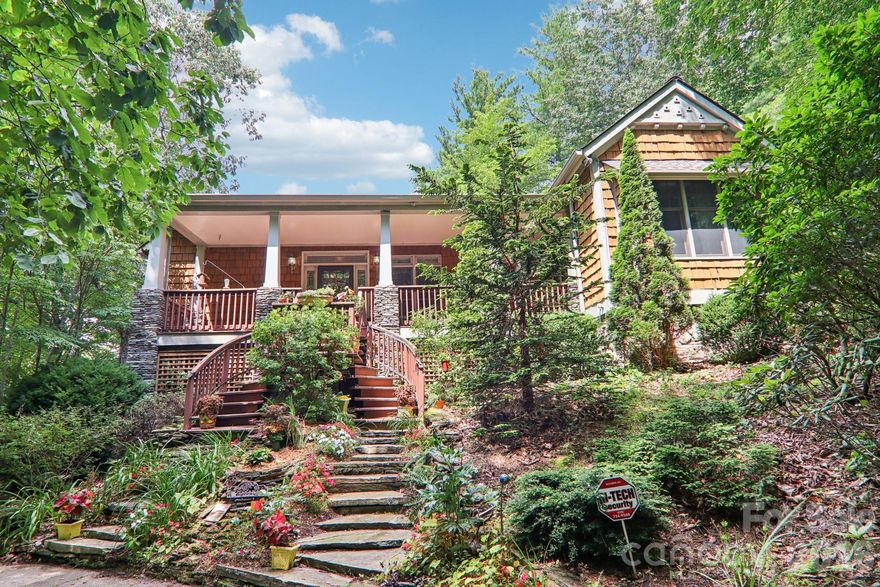 Escape to your charming Craftsman Style home located in the desirable Swiss Pine Lake Community located just five minutes from the Blue Ridge Medical Center, the Grassy Creek Golf Course, and the Blue Ridge Parkway, with convenient access to interstates 26 and 40 and Asheville. 

Set on nearly an acre, this one level two bedroom, two bath home  boasts many special features  throughout. Custom-designed glass windows and an artisan tiled foyer greet you as you walk into the spacious living room with cathedral  ceilings and a stunning stone fireplace. 

The kitchen is a true centerpiece, featuring bespoke rosewood cabinetry, a walk-in pantry, a gas range, and the  stone pass-through gas fireplace that adds warmth and ambiance to both the kitchen and living space. The Chef’s kitchen has a 5 burner gas stove, ample cabinet space, and the extra large pantry has many drawers and cabinets for all your cooking needs. 

Designed for indoor-outdoor living, the home offers multiple inviting spaces to relax and entertain, including a spacious screened-in porch that could be converted into a third bedroom, a covered front porch, and rear deck; perfect for taking in the surrounding natural beauty year-round. 

A lower-level garage provides ample space for parking, a workshop, or additional storage. 

Additionally, the community offers many amenities such as a private beach, pavilion, lake for boating, swimming or fishing, and maintained walking trails and waterfalls.  

Whether you’re looking for a full-time residence or a mountain escape, this home delivers a rare combination of craftsmanship, setting, and lifestyle.  Schedule your private showing today. 

Note that the stairs to the  front door have been newly replaced  and brought up to current building code (see new pics toward end of photos).