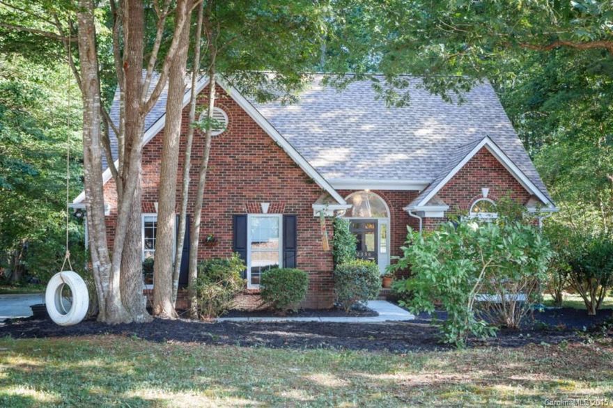 Great find in Hunley Creek! Less than 5 minutes to 485.  Beautiful, Private home on .46 acres.  Features Fireplace, French Country kitchen with movable butcher block island and dining area. New flooring throughout first and second floor. Upstairs Carpet installed with premium puppy pad. New roof installed 2014. Master on Main, Living room with Vaulted ceiling, Large Playroom/sunroom that overlooks private backyard and opens to fantastic Deck, perfect for entertaining or a peaceful retreat.