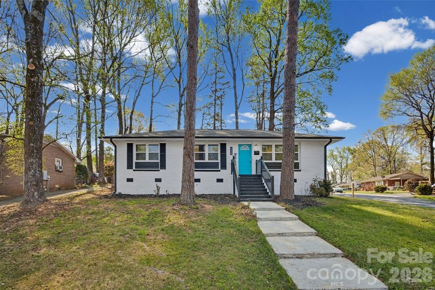 Welcome to this beautifully remodeled 3-bedroom, 2 full bath home situated on a desirable corner lot with mature, picturesque trees. Originally designed as a 1.5-bath property, it has been thoughtfully upgraded to include two full bathrooms—adding both value and everyday functionality. This home has been completely renovated from top to bottom, offering a truly move-in ready experience. Step inside to a bright, open floor plan featuring a stunning brand-new kitchen with soft-close cabinetry, gorgeous quartz countertops, and sleek stainless steel appliances—perfect for both everyday living and entertaining. Throughout the home, you’ll find new luxury vinyl plank (LVP) flooring and fresh paint, creating a clean, modern, and inviting atmosphere. Every detail has been carefully considered, including new lighting fixtures, ceiling fans in all bedrooms, new doors, and elegant shoe molding finishes. Major system upgrades provide peace of mind for years to come, including energy-efficient windows, a new HVAC system, brand-new roof, New plumbing, and enhanced insulation in both the attic and crawl space, complete with a new vapor barrier. The exterior has been just as thoughtfully updated with fresh paint, new soffits, new gutters, professionally refreshed landscaping—Fenced yard, enhancing curb appeal and overall charm. Conveniently located near I 485, Uptowm Charlotte ,  University City. Only 15 minutes to NODA &  Plaza Midwood.  This home truly feels like new construction while offering the character of an established neighborhood with No HOA Don’t miss this incredible opportunity!