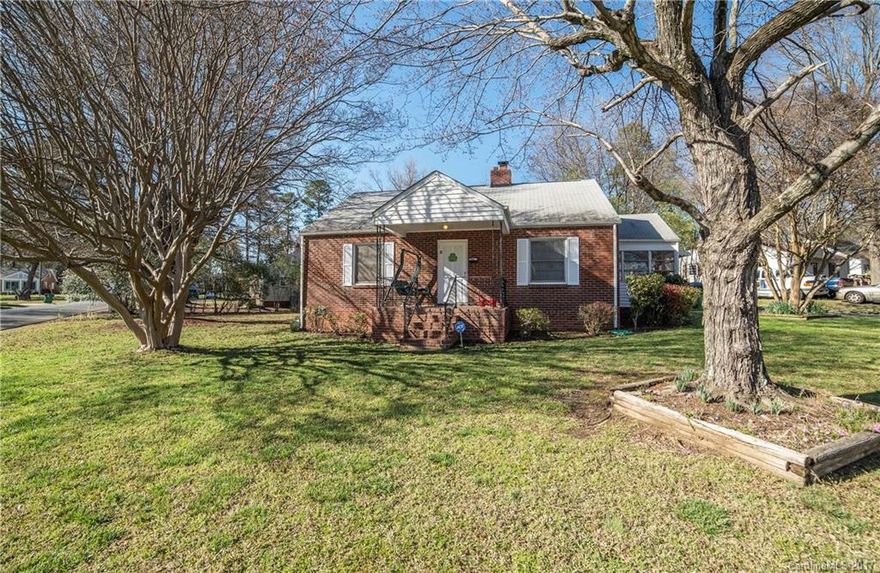 A rare opportunity right around the corner from NoDa and Plaza Midwood! On Plaza Acres' most desired street, this charming brick bungalow is ready for you to call home. Beautiful corner lot on quaint setting. Step inside and find a treasure of character, from beautiful original hardwood floors and tile in bath to original crystal door knobs. Property is well maintained and ready for your personal touch. Many homes nearby are being renovated or built new...better hurry when this is under $200k!