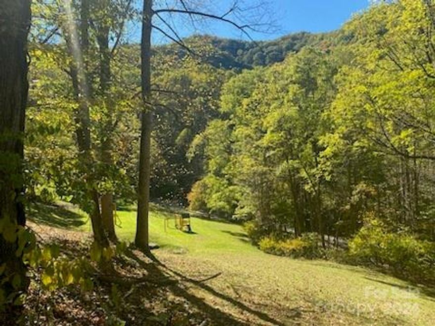 The lot is located close to the entry of the Smoky Mountain Retreat, overlooking the playground. It is a perfect location for someone that wants to be in a gated community but low on the mountain with easy access. Part of lot A-3 and lot A-2 will be combined.