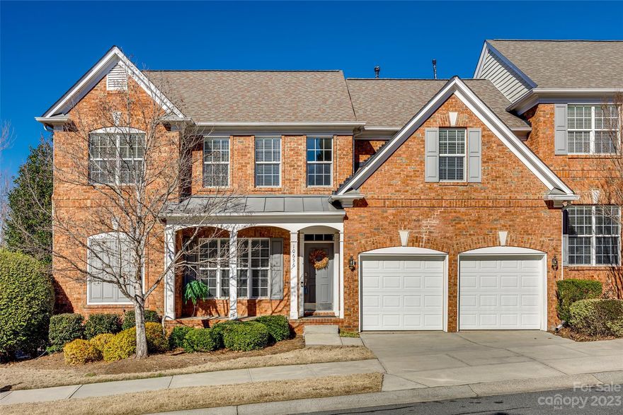 NEW AND FRESHLY UPDATED END UNIT W/ FINISHED BASEMENT in Ivy Ridge at Ballantyne subdivision. Gorgeous brick town home, 2 car garage w/ Tesla charger installed. Primary bedroom on main level w/tray ceiling, large primary bath w/ glass shower, garden tub, granite tops, walk-in closet. Spacious open kitchen w/ granite countertops and access to the balcony w/natural gas line for grill. 2 large bedrooms, one bath and a loft upstairs. Main level features dining room w/ tray ceiling, great room w/ vaulted ceiling and gas fireplace. Beautiful new bamboo hardwoods and tile on main level with new carpet in primary bedroom and all upstairs. Walk-in attic with lots of storage. Beautiful walk-out basement that features a full and half bathroom, large living area, surround sound, fitness room, bar/entertainment, extra bonusroom currently being used as a bedroom. Located in the desirable Ballantyne area across from the Ballantyne Reimagined project. Close proximity to shopping,dining & more.