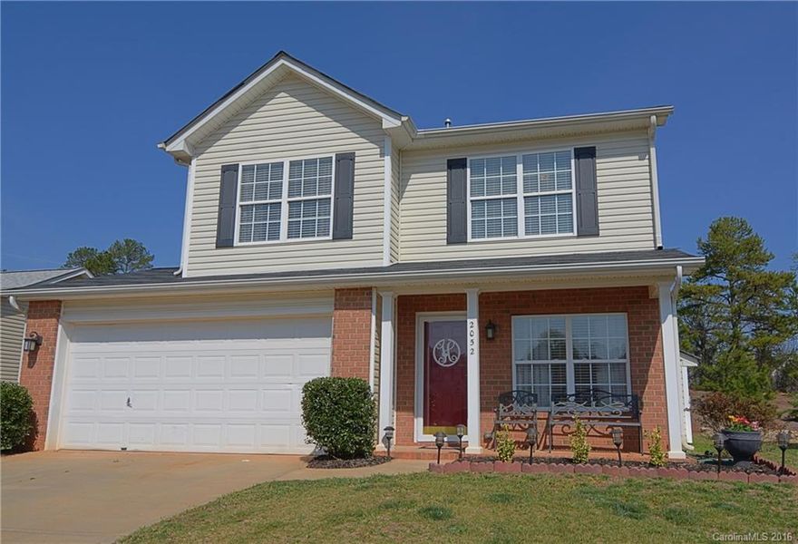 Former model home with beautiful updates like stainless steel appliances in the very spacious kitchen, new windows and blinds in the whole house, new paint, new fixtures and new lighting in all bathrooms. All 3 BR plus great loft located upstairs. Master suite features double sinks, walk-in closet, separate tub and shower. LR has fireplace and ceiling fan. 2car garage and front porch. Patio in back. Great neighborhood with community pool, conveniently located off 521 in sought after Indian Land.