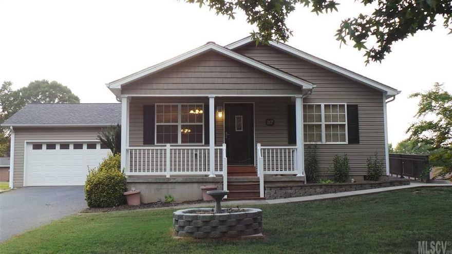 Great Floor plan in this 3 bedroom, 2 full bath ranch with Open Kitchen/Living/Dining.  Fully Handicapped Accessibility with Ramps, Wide Entrances, and Master Bath with Handicapped Tiled Shower. Laminate Wood Pergo Flooring in Living Room Dining/Kitchen and Hallway. Tiled Baths. Bedrooms have carpet. Accessibility to Fenced in Backyard with a Workshop/Dog Kennel from Rear Deck. All Decking and  Ramps are made from Maintenance Free Trex Materials.. Eat in Kitchen with lots of Oak Cabinets. All Kitchen Appliances Remain. Laundry Room offers Large Utility Closet.  Double Attached Garage.  Small very maintainable lot with Landscape Block flower beds. City Water and Sewer.  Very nice home and convenient for all your retail/shopping needs.