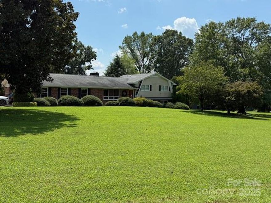 Split level home with space to grow.  The main level features a kitchen, family room/dining, living room and there is a rock fireplace.  The upper level features 3 bedrooms and 1 bathroom.  The basement level features a kitchen/living combination plus a flex room and bathroom and a washer/dryer hookup area.  The pool area features beautiful landscaping and there is a detached pool house that has two flex spaces with closets  plus a bath and spacious living room and kitchen space with a porch overlooking the pool.  The basement foundation of the pool/guest house has been a commercial kitchen.  There is also a detached carport and shed in the back of the guest house area.  Heat and air approximately  3 years old plus the home has had updates to insulation and crawlspace area for added efficiency.