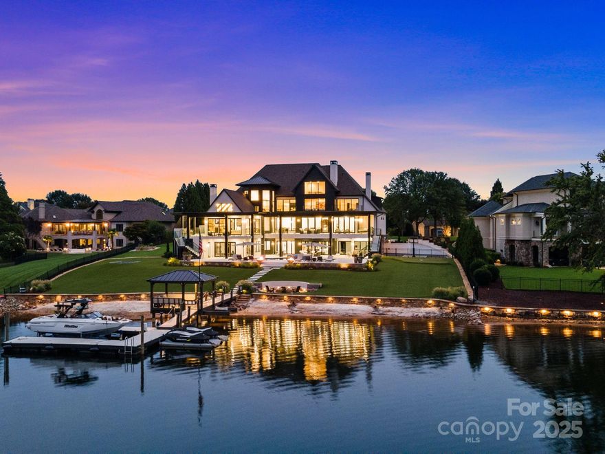 Experience the pinnacle of Lake Norman living from this extraordinary lakefront estate. Nestled just outside The Peninsula Club within the exclusive gated enclave of Connor Quay, The Legacy House marries coastal modern design with unparalleled serenity. Set on 1.2 sprawling acres, the home features expansive windows, sleek contemporary finishes, and state-of-the-art appliances, framing breathtaking lake views at every turn. An open, flowing floor plan invites grand entertaining and effortless everyday living. Just 20 minutes from Charlotte, immerse yourself in 520 miles of shimmering shoreline, vibrant sunsets, waterfront dining, leisurely cruises, and exhilarating regattas. This is modern architecture, luxury, and lakeside lifestyle at its finest, a true legacy on Lake Norman.