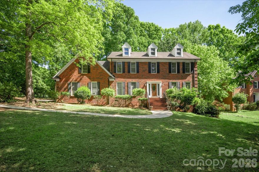 Located in the heart of Weddington and zoned for Union County Schools, 8149 Shannon Woods Lane offers over 3,900 sq ft of thoughtfully designed living space, including a rare finished basement. Perfectly positioned directly across from Weddington Optimist Park, this 4-bedroom, 3.5-bath home combines everyday livability with long-term potential. The layout features a formal living room, dining room, spacious family room, and a versatile bonus room, providing flexibility for both entertaining and daily life. The home is fully livable and move-in ready, while also offering the opportunity to restore and enhance its timeless character over time. Beautiful existing details include a brick exterior, hardwood flooring throughout the main level, engraved crown molding, and elevated 5-inch baseboard trim. Classic elements that set a strong foundation for personalization. Set on a generous lot adjacent to a wooded area, the property offers exceptional privacy and a peaceful backdrop. A unique opportunity to enjoy the home as-is while gradually elevating it into your vision in one of Weddington’s most desirable settings.