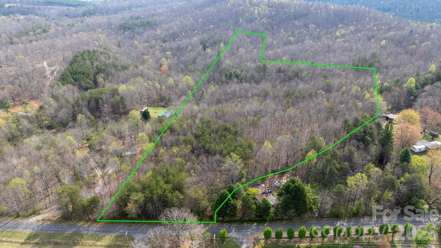 Discover the perfect canvas for your dream retreat or development with this expansive 20-acre unrestricted
land in the peaceful, rural setting of Nebo, NC. Just 15 miles from Lake James and 35 miles from Lake Lure, this
property offers the ideal balance of seclusion and accessibility to nearby recreation and amenities. Neighboring utility access available as well.

Enjoy convenient access from a state-maintained paved road while having complete privacy amidst mature
woods and gently rolling terrain. Whether you envision a private estate, hobby farm, or recreational getaway,
the natural beauty and versatile landscape provide endless opportunities.

Experience the tranquility of country living without sacrificing convenience-your private sanctuary awaits! Go and Show Today!