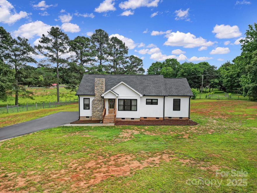 Welcome to 456 Rainbow Circle, where privacy, comfort, and character come together. Tucked away behind a natural tree-lined buffer, this home offers a peaceful retreat with a true sense of seclusion from the road. Step inside to discover a bright and welcoming interior, featuring a spacious dining area with a large open window that fills the space with natural light. The kitchen is full of charm, complete with a stylish tile backsplash and thoughtfully chosen light fixtures that add warmth and personality. The primary suite is a standout, offering not only his-and-hers closets but also private access to the back deck—perfect for quiet mornings, late-night conversations, or a private entry when needed. Out back, enjoy a serene setting where neighbors keep to themselves and the atmosphere remains calm and quiet—ideal for those seeking peace and personal space. If you’re looking for a home that offers both connection and quiet, 456 Rainbow Circle is the one to see.
