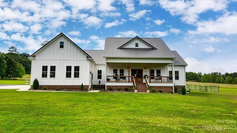 Photo of 261 Lakewood Road, Oakboro, NC 28129 (MLS # 4044434)
