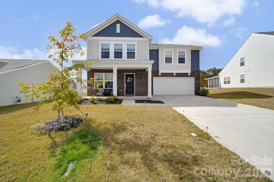 Welcome to the sought-after Hughes layout in the newly developed Walkers Mill community! This spacious two-story home offers 5 bedrooms, including a main-level bedroom with a full bathroom featuring a walk-in shower—perfect for guests or multi-generational living. Upstairs, you’ll find a versatile loft space, four additional bedrooms, a full hall bathroom with double sinks, and a convenient laundry room with bonus storage closet. The heart of the home is the open-concept kitchen, complete with quartz countertops, a large kitchen island, walk-in pantry, and gas oven. A sliding glass door leads to the extended concrete patio, ideal for outdoor entertaining. Upstairs bedrooms and hallway feature plush carpet for added comfort. This home is move-in ready and still under the builder's structural warranty, which transfers to the new owner for peace of mind. Only 6 miles to Interstate 77.