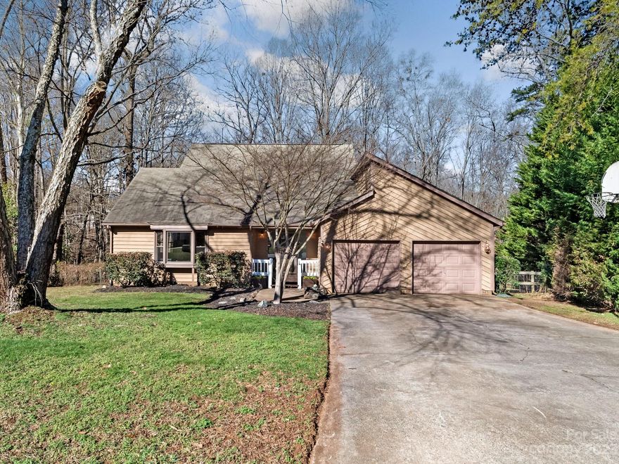 Situated on a .98 acre, cul-de-sac lot, this three bedroom home represents an excellent opportunity in Autumnwood. The open floorplan is ideal w/ multiple living spaces & new flooring throughout much of the 2134 sq. feet. The kitchen is equipped w/ stainless appliances including a gas range. It adjoins the family room w/ charming stone fireplace & access to the screened porch for ease of entertaining. The main level primary bedroom boasts an ensuite bath, walk-in closet w/ custom storage & views of the rear yard. Two spacious bedrooms on the second level have also been upgraded w/ custom closets. The loft offers flexible space which is great for a home office. Recent improvements include: HVAC equipment (11/2021 & 7/2023), a whole house water filtration system & replacement of rear decking. Two-car garage has been updated w/ epoxy flooring & slat wall storage system. This property is well-located near the light rail system and Toby Creek Greenway.