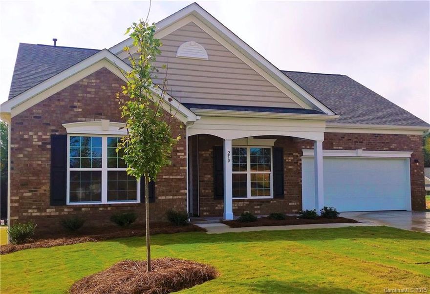 Desirable Ranch Home in popular Fort Mill, offers a split bedroom floorplan, open and vaulted Great Room, Breakfast and Kitchen plus a formal Dining Room!  Owner's Suite on main level boasts a tray ceiling, separate garden tub and shower, dual vanity, and walk-in closet.  Granite countertops in kitchen with 42" cabinets, and stainless appliances.  Fireplace in Great Room.  Full brick construction, 2-car garage, hardwoods in main living areas, and extended patio in the backyard!