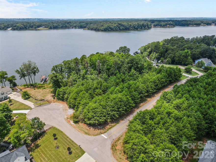 Looking for the ideal lakeside lot to build your forever home? This interior corner lot is just minutes from the water in the highly sought-after Edgewater community—perfectly located between Charlotte, NC and Columbia, SC. 

Edgewater offers resort-style amenities including an award-winning 18-hole Jack Nicklaus golf course, tennis and pickleball courts, a community pool, walking and biking trails, kayak and paddleboard launch, RV and boat storage, volleyball courts, a lakeside pavilion, clubhouse with monthly events, and a marina restaurant. 

With access to the 3,300-acre Fishing Creek Lake and peaceful nature-filled surroundings, this lot offers the lake lifestyle you’ve been dreaming of.