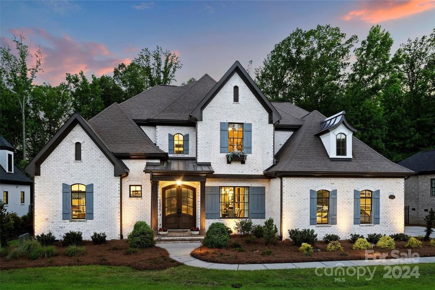 Stunning AR home in desirable Stevens Grove on lrg 0.65 acre lot. Gorgeous 2 stry foyer w/curved stair tower. Dining rm w/tray ceiling & heavy molding. Great rm w/tray ceiling, tile surrnd gas log FP w/shiplap detail & multi-slide glass door providing wonderful indoor/outdoor living. Screened porch w/tongue & groove ceiling & stone surrnd FP. Chefs Kit w/quartz ctops, GE Monogram appls, lrg islnd, decorative glass cabs, walk-in pantry & brkfst area. Wet bar w/Transtherm 182 bottle wine fridge & bar stool seating. Private office w/lrg windows & vaulted ceiling. Dropzone & laundry w/sink & built-in cabinets. Primary suite on main w/custom molding detail & wall of windows overlooking private bckyrd. Primary bath w/dual quartz ctop vanities, soaker tub & huge walk-in shower. Bonus rm w/14' vaulted ceiling & beam detail, built-in cabinetry w/bev fridge & media rm. Serene & private wooded yard, expansive deck & fenced yrd w/irrigation. Immaculate condition, excellent location & schools!