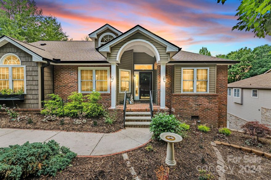 Truly immaculate 3 bedroom, 2 bath single-level home in coveted Carriage Park! Immerse yourself in natural beauty with mature landscaping & mountain layers. Live easy in a turn-key "better than new" home, where past homeowners spared no expense on new roof, windows, siding, gutters with guards, hardwood floors, expanded Timbertech deck, kitchen renovation with gorgeous granite countertops and stainless appliances, water heater, remodeled master bath with comfort height toilet, window treatments, & custom milled bookcase. Ideal split bedroom floor plan provides privacy & feels spacious. 24-hour gated security, clubhouse, pool, pickleball courts & walking trails allows carefree time to explore with new friends! Or, let the world come to you with visits from curious deer & white squirrels in your front yard. 2-car garage & crawl-space provide ample storage. Charming Hendersonville just 10 mins South, the airport and Asheville just 15 and 30 mins North, all of WNC is yours to discover!