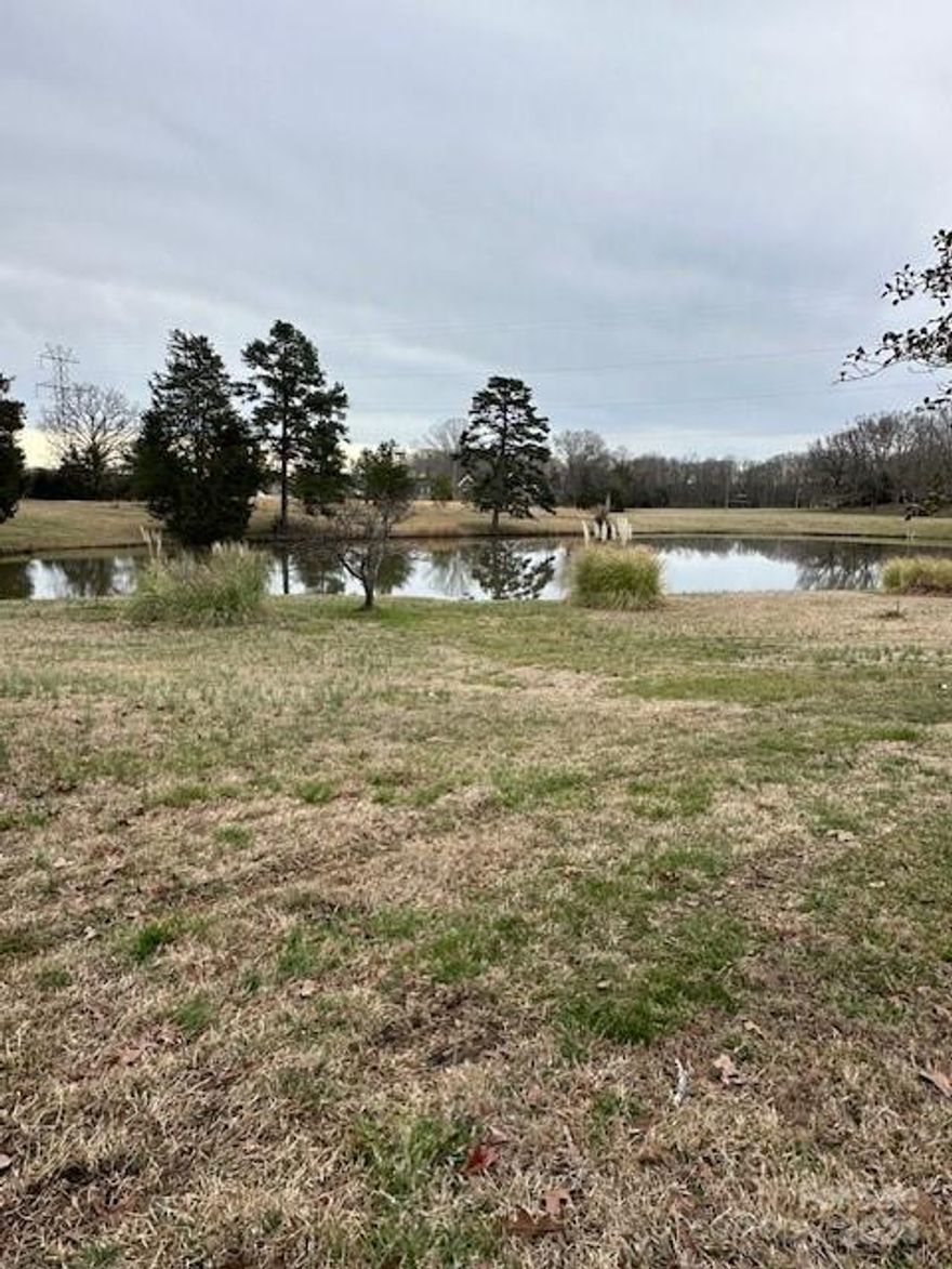 This acreage is also listed under RESIDENTIAL single-family, as a home is in place on the property and has been lived in since the 60's until recently. Residential listing MLS# is: 4126000.  It truly is a great lot to build a new home on with the POND located on the property!  So conveniently located to Providence Rd, downtown Waxhaw, Marvin and unlimited opportunities for retail shopping and restaurants. Home needs complete updating or if torn down. This lot is surrounded by luxury homes along all of Wingard Rd.  It's rare to find such a large lot (1.91 ac) in an area that is near established eateries, retail and work commutes (very close to I-485) and still have the serene, quiet setting and privacy of your home life after returning home from a hard days work! Imagine having family gatherings and celebrate by fishing, cookouts, outdoor parties, weddings, etc. and even paddle boating when the kids or grandkids beg you for one! Power is NOT turned on.