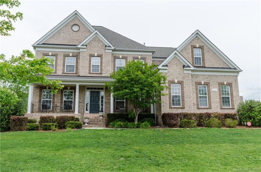 Gorgeous full brick home in popular Fox Ridge, just minutes from Ballantyne. Located on a corner lot at the edge of a cul de sac, this home has it all! Master suite on main level, 3 car garage, open floor plan, spacious rooms, high ceilings, gorgeous hardwoods, brand new carpet, and a bonus room with an adjoining mini bonus room. Conveniently located near community pool.