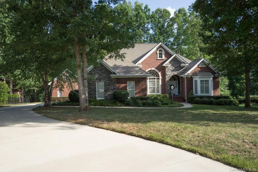 Custom built French Country home in a "Jewel" of a neighborhood. Secluded back porch runs the entire width of the house. Gourmet kitchen has custom cabinetry, tile backsplash, island, & granite. Large family room with vaulted ceiling and stone fireplace. Master suite & newly remodeled bathroom includes dual vanities with granite, large tile, granite shower & claw foot tub. Upgraded fixtures and lighting throughout! Detached "Workshop-ManCave" has over 800 sqft for hobbies & tons of storage.