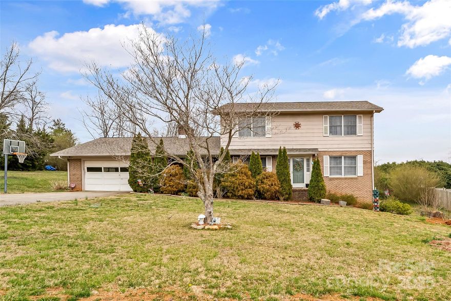 Discover the perfect blend of comfort and convenience with this cozy 4 bedroom, 3 bathroom home located just minutes from downtown Morganton. This home features a spacious .92 acre yard perfect for family activities or room for pets. Inside, the home offers lots of natural light along with the pleasing aesthetics of a beautiful wood burning fire place. The home also offers a pool to enjoy those hot summer days. The home also has an attached 2 car garage on the main level and garage door access to the basement. Don't miss this opportunity to make this home yours!