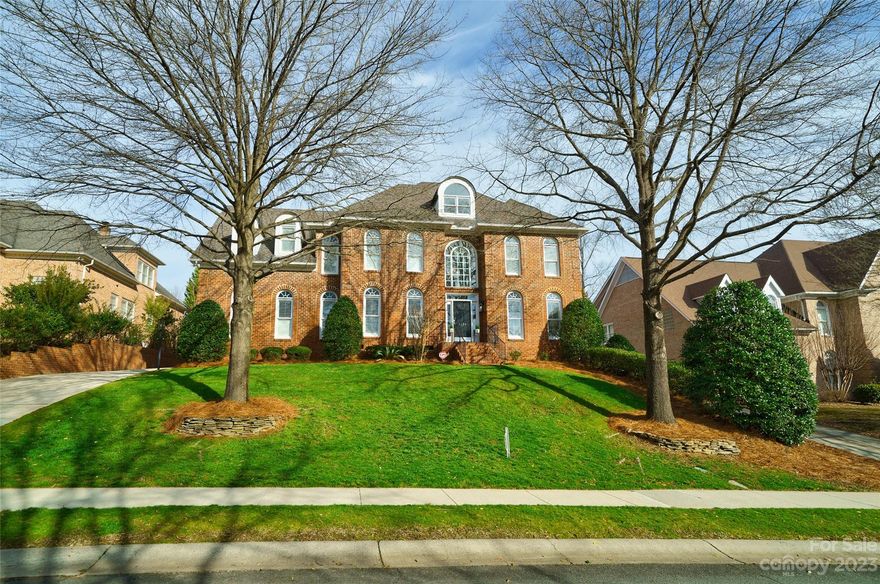 Full brick basement home in coveted Bailewick! You will adore the floorplan, ALL THE SPACE & updates in this executive home. Built with quality and function in mind, this light and bright full-brick GEM features hardwoods throughout, a soaring two-story foyer flanked by formal living spaces, an expansive kitchen perfect for entertaining, TWO bonus rooms + a fully finished basement/possible in-law suite. Enjoy fresh meals prepared in a gourmet kitchen complete with Wolf range & unwind on the lovely screened porch overlooking the flat & fenced backyard. Keep things tidy in the great mudroom/laundry room off the 3 car garage. Organize your clothes in the dual walk-in custom closets and rinse off the day's stress in the soaking tub or seamless glass shower. Large bedrooms upstairs feature homework stations/desks and the additional baths are gloriously updated. All of this in a convenient South Charlotte location zoned for top-rated schools! Luxury + space + location = WOW!!