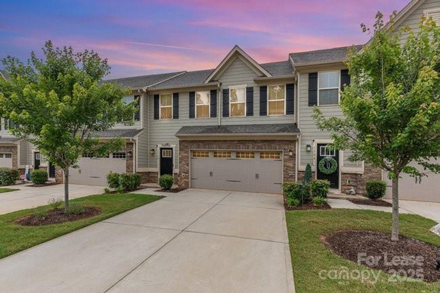 Gorgeous townhome in Waterfront at Langtree, blending luxury and convenience just minutes from I-77! This nearly new 3-bed, 2.5-bath retreat boasts an open-concept main level with a stylish kitchen featuring quartz countertops, stainless steel appliances, gas stove, and island—perfect for entertaining. Upstairs, a spacious primary suite with dual walk-in closets, two additional bedrooms, a loft, and laundry room await. Enjoy a private, fully fenced backyard, two-car garage, and ample driveway space. HOA covers lawn maintenance, and washer/dryer convey. Steps from Lake Norman, relax by the community fire pit or pergola, or stroll to Langtree at the Lake for upscale dining and shopping. All Seasons Marina and Davidson College Lake Campus are minutes away. Paddleboard, kayak, or enjoy outdoor music events nearby. Ideal for a low-maintenance, lakefront lifestyle with top-tier finishes. Small dog (up to 40 lbs) conditional. Available now—schedule a visit or virtual tour today!