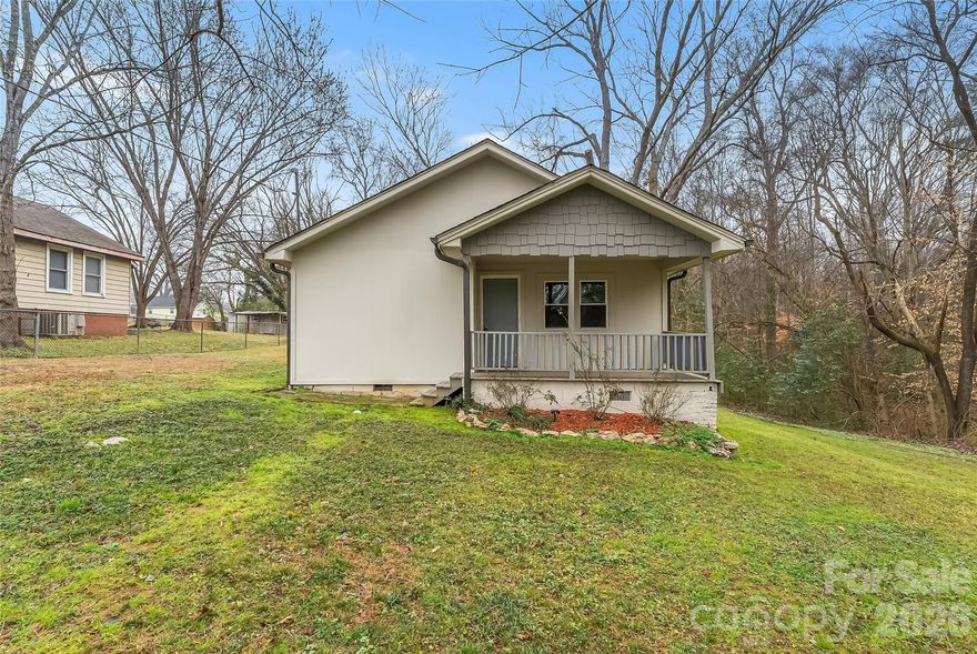 Charming and refreshed 1920 bungalow available in Stanley! This cozy home offers peaceful, private one-level living at the end of a dead-end road - combined with convenient shopping and dining close by, and less than 20 minutes to the US National Whitewater Center and less than 30 to Charlotte-Douglas Airport. Enjoy the recent cosmetic updates, plus peace of mind is yours with roof and HVAC updates in 2022. Three bedrooms and two bathrooms provide plenty of space, with a laundry/mud room for convenience and storage, and a well-appointed kitchen with stainless steel appliances. Relax on the rocking-chair front porch or in the backyard around the fire pit with family and friends. Come see this home today!