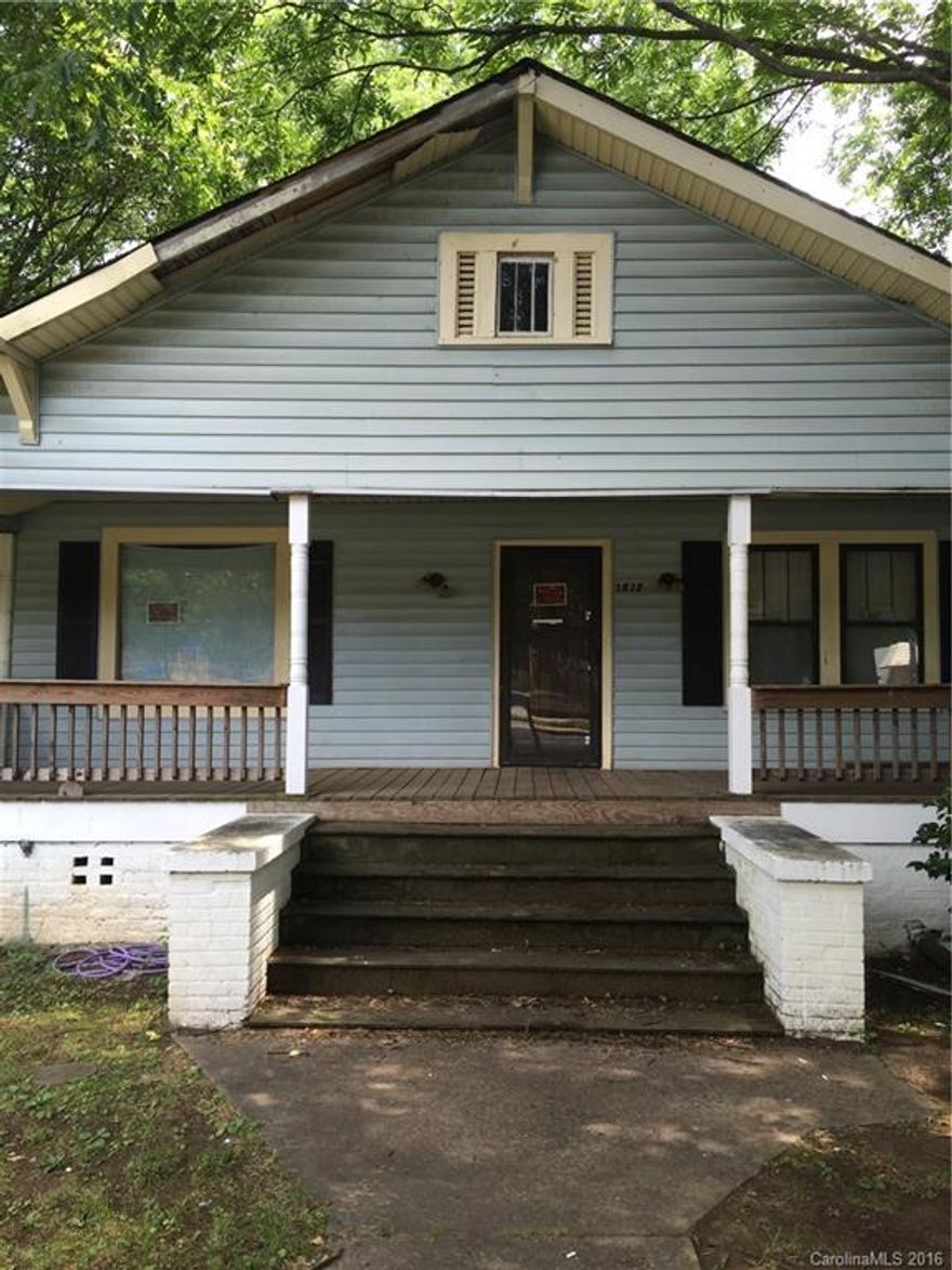 This property has incredible profit potential. Sitting just 4 lots down from a house that was rehabbed and sold for over 300K.  This property is being sold as is with no warranty on existing fireplace.  High traffic area.  Near bus stop.