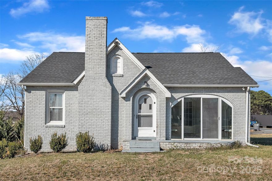 Check out this charming full-brick home with no HOA, conveniently located near Downtown Kannapolis, Highway 29, and I-85. This beautifully remodeled house blends vintage charm with modern upgrades, retaining much of its original character while adding contemporary comforts. Step inside to discover refinished hardwood floors and spacious living room, featuring a brick fireplace and a textured accent wall, creates a warm and inviting atmosphere. The kitchen and bathroom showcase brand-new tile, granite countertops, stylish cabinets, and rose gold fixtures for a sophisticated touch. Off the primary bedroom, you’ll find a cozy sunroom—perfect for unwinding. Need extra storage? The expansive basement has you covered. Basement recently was professionally waterproofed to ensure a dry, worry-free basement and long-lasting protection and peace of mind for the next homeowner. Backed by a 15-year transferable warranty. A new exterior foundation drainage system with extension was installed. Basement walls have been freshly painted for a clean, move-in ready appearance. This upgrade ensures a dry, protected, and usable basement—a major advantage for long-term home value and buyer confidence. Detached one-car garage adds convenience. Located just minutes from the newly revitalized Downtown Kannapolis, you’ll have easy access to the ballpark, fantastic restaurants, and lively breweries. Don’t miss your chance to see this stunning property—schedule a showing today!